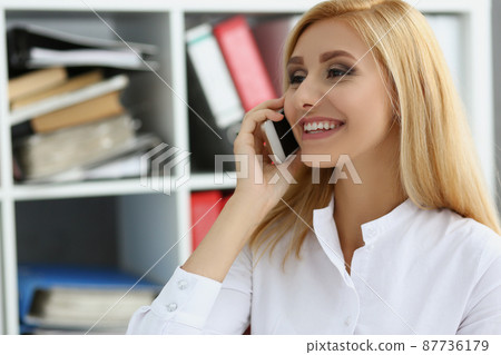 Happy worker talk on phone, chatting during work time, lazy employee 87736179