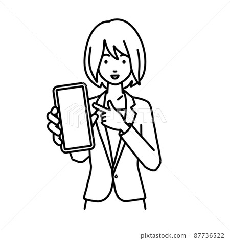 A woman in a suit standing and pointing at her smartphone 87736522