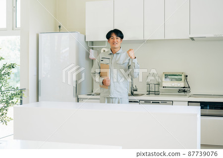 Men in kitchen and work clothes 87739076