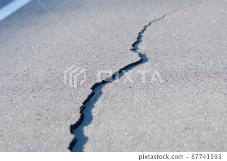 Cracked road surface requiring immediate repair of asphalt concrete pavement Cracked road surface requiring immediate repair of asphalt concrete pavement 87741593