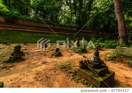 Ancient tunnel at (Wat Umong Suan Puthanatham) is a Buddhist temple is a major tourist attraction with green forest nature in Chiang Mai,Thailand. 87744317