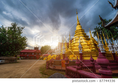 Beautiful Ancient golden color Pagoda in the Phan Tao temple is a Buddhist temple in the historic centre tourist attraction an ancient Thai art and is Public places in Chiang Mai,Thailand. Beautiful Ancient golden color Pagoda in the Phan Tao temple is a Buddhist temple in the historic centre tourist attraction an ancient Thai art and is Public places in Chiang Mai,Thailand. 87744336