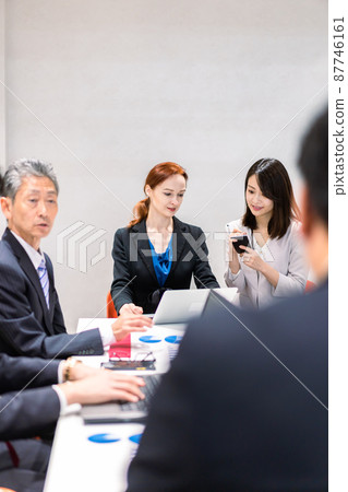 A woman interpreting at an international conference 87746161