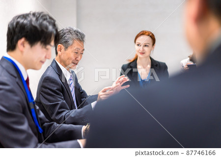 A woman interpreting at an international conference 87746166