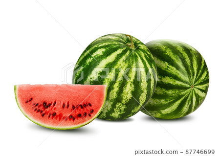 Two green, striped watermelons isolated on white with copy space for text, images. Cross-section. Berry with pink flesh, black seeds. Close-up. 87746699