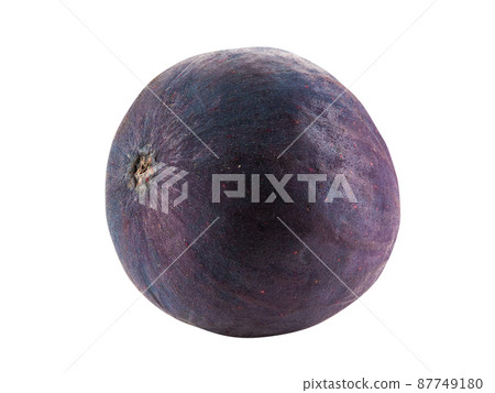 Purple fig isolated on white with copy space for text or images. Soft, sweet fruit, skin is very thin, has many small seeds inside of it. Close-up. Purple fig isolated on white with copy space for text or images. Soft, sweet fruit, skin is very thin, has many small seeds inside of it. Close-up. 87749180