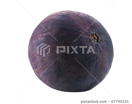 Purple fig isolated on white with copy space for text or images. Soft, sweet fruit, skin is very thin, has many small seeds inside of it. Close-up. Purple fig isolated on white with copy space for text or images. Soft, sweet fruit, skin is very thin, has many small seeds inside of it. Close-up. 87749191