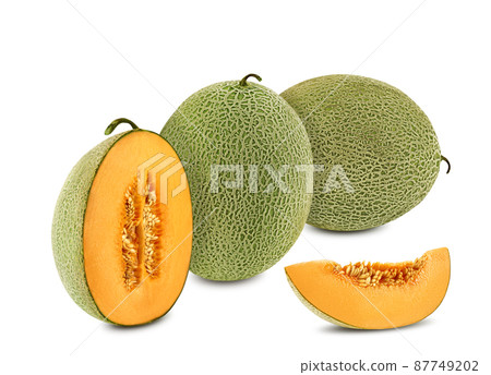 Delicious cantaloupe melon in a cross-section, isolated on white background with copy space for text or images. Side view. Close-up shot. 87749202