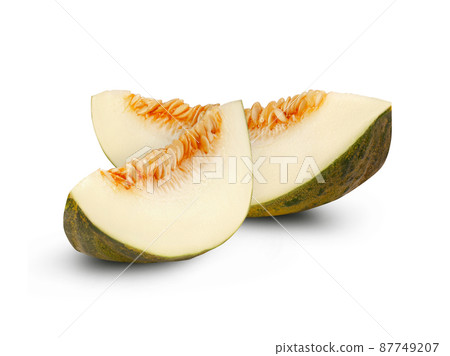 Two tasty green tendral melon slices in cross-section, isolated on white background with copy space for text or images. Side view. Close-up shot. 87749207