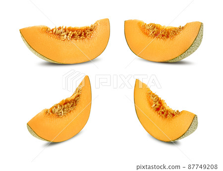 Four delicious cantaloupe melon slices in a cross-section, isolated on white background with copy space for text or images. Side view. Close-up shot. 87749208