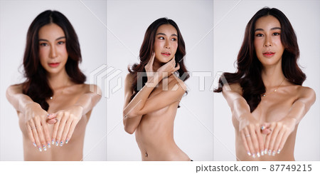 Nudity Woman poses fashion with hands and arms to protect herself with art. Nude topless female 87749215