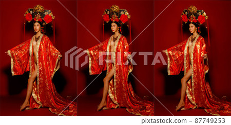Asian Woman wear China Royal empress traditional costume with golden line design dress and headwear 87749253