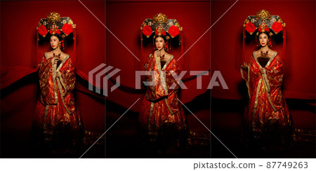 Asian Woman wear China Royal empress traditional costume with golden line design dress and headwear 87749263
