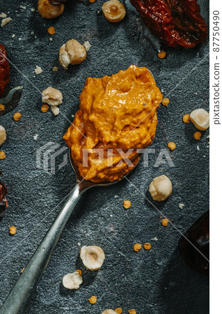 spoon with typical catalan romesco sauce spoon with typical catalan romesco sauce 87750490