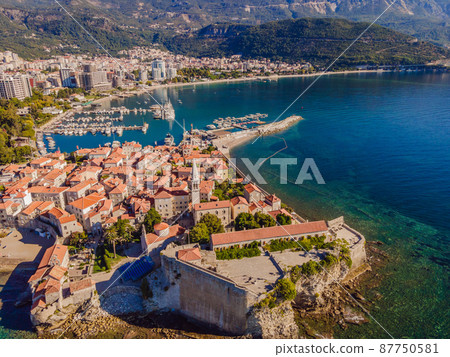 Old town in Budva in a beautiful summer day, Montenegro. Aerial image. Top view Old town in Budva in a beautiful summer day, Montenegro. Aerial image. Top view 87750581