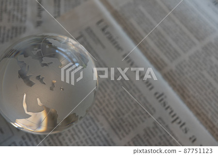 Glass globe and English newspaper (Ukraine situation) Glass globe and English newspaper (Ukraine situation) 87751123