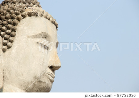 Head of Buddha statue and sky. Head of Buddha statue and sky. 87752056