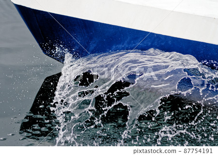 Boat Wave ocean trace on blue sea fresh water background Boat Wave ocean trace on blue sea fresh water background 87754191