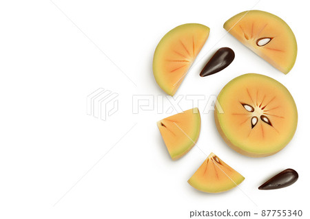 Sapodilla slices isolated on white background with clipping path and full depth of field. Top view with copy space for your text. Flat lay 87755340