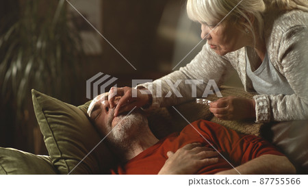 Aged wife taking care of ill husband Aged wife taking care of ill husband 87755566
