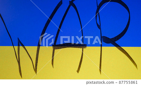 WAR written on the Ukrainian flag. Russian invasion of Ukraine concept. Crisis. WAR written on the Ukrainian flag. Russian invasion of Ukraine concept. Crisis. 87755861
