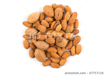 Almonds on a white background Almonds on a white background 87757138