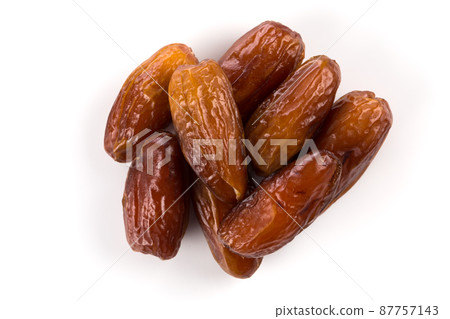 Date fruit close up isolated on white background 87757143