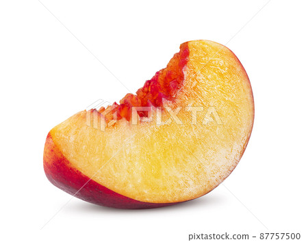 Unpitted, smooth-skinned nectarine fruit slice isolated on white background with copy space for text or images. Close-up shot. Unpitted, smooth-skinned nectarine fruit slice isolated on white background with copy space for text or images. Close-up shot. 87757500