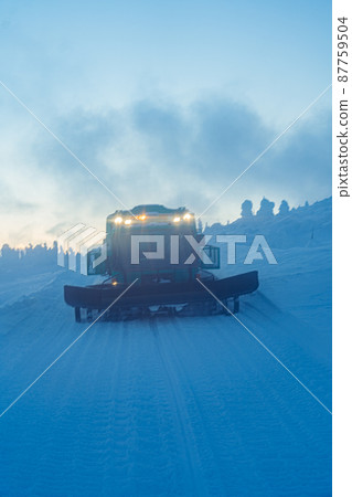Snowmobile running on the snow Snowmobile running on the snow 87759504