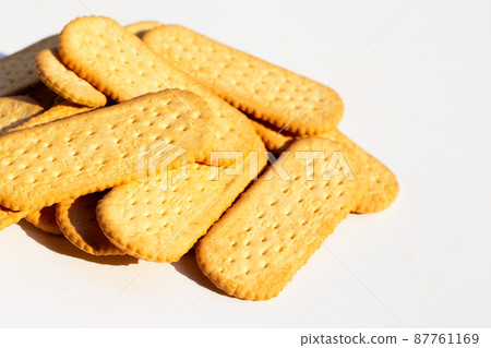Biscuits on white background. Biscuits on white background. 87761169