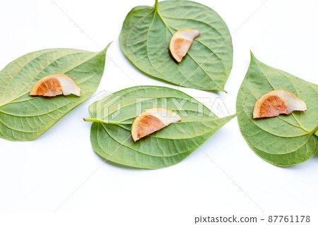 Chewing betel nut, Betel nut on betel leaves 87761178