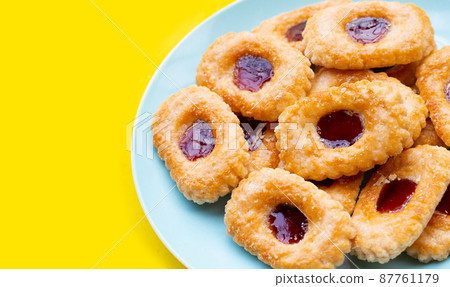 Puff pastry cookies filled with jam Puff pastry cookies filled with jam 87761179