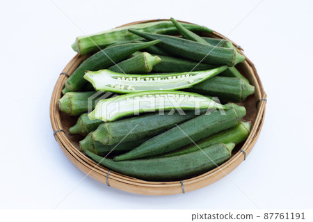 Fresh okra on white background Fresh okra on white background 87761191