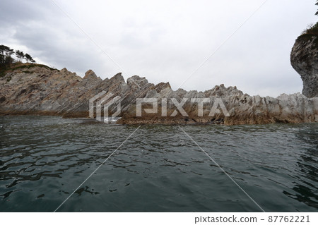 A strange rock in Jodogahama, Miyako City, near the mountain of swords A strange rock in Jodogahama, Miyako City, near the mountain of swords 87762221