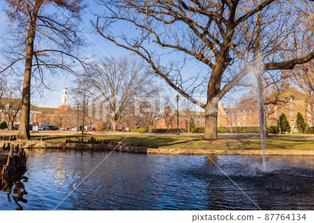 Sunny exteior view of the campus of Oklahoma State University 87764134