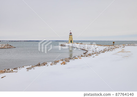Overcast view of the snowy Lake Hefner lighthouse Overcast view of the snowy Lake Hefner lighthouse 87764140