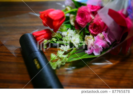 Diploma and bouquet Diploma and bouquet 87765878