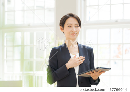 Woman in a suit 87766044