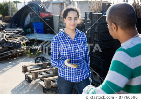 Good neighbors talking in the backyard 87766596
