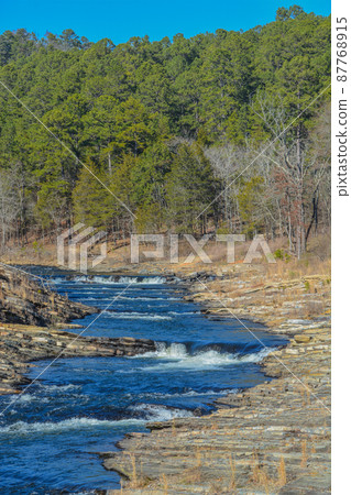 Mountain Fork River winding through Beavers Bend State Park in Broken Bow, Oklahoma  87768915