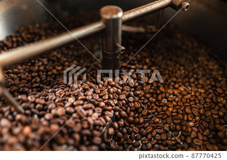 Roasted coffee beans in a cooling machine 87770425