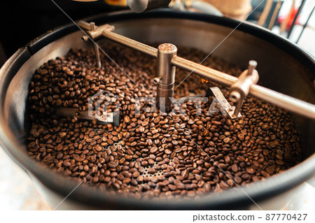 Roasted coffee beans in a cooling machine 87770427