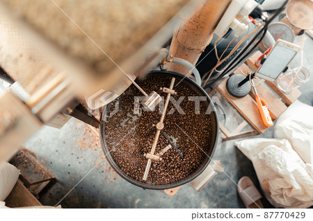 Roasted coffee beans in a cooling machine 87770429