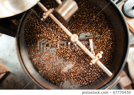 Roasted coffee beans in a cooling machine 87770430