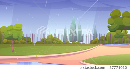 Park at rainy day, city area with paths and fence 87771010