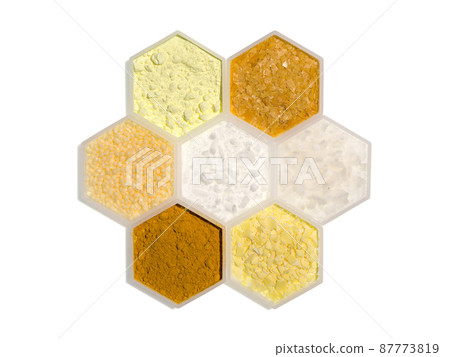 Chemical ingredient in hexagonal molecular shaped container. Sulfur Powder, Carnauba Wax, Candelilla Wax, Cetyl Esters Wax, Flake Salt, Curcuma Powder and Sodium Sulfide Flakes. 87773819