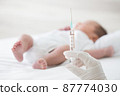 Syringe with blur baby background. Vaccine antivirus for infant .concept 87774030