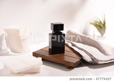 Everyday scenery with a perfume bottle 87774207