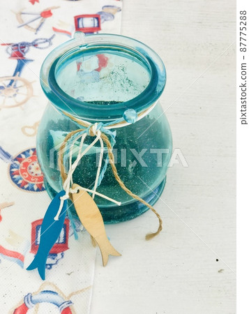 Decorative jar with volcanic sand 87775288