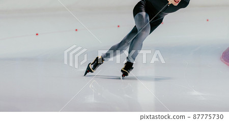 male athlete speed skater run ice skating track 87775730